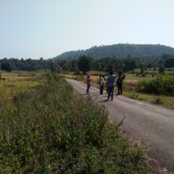 My colleagues walking on a scenic countryside road